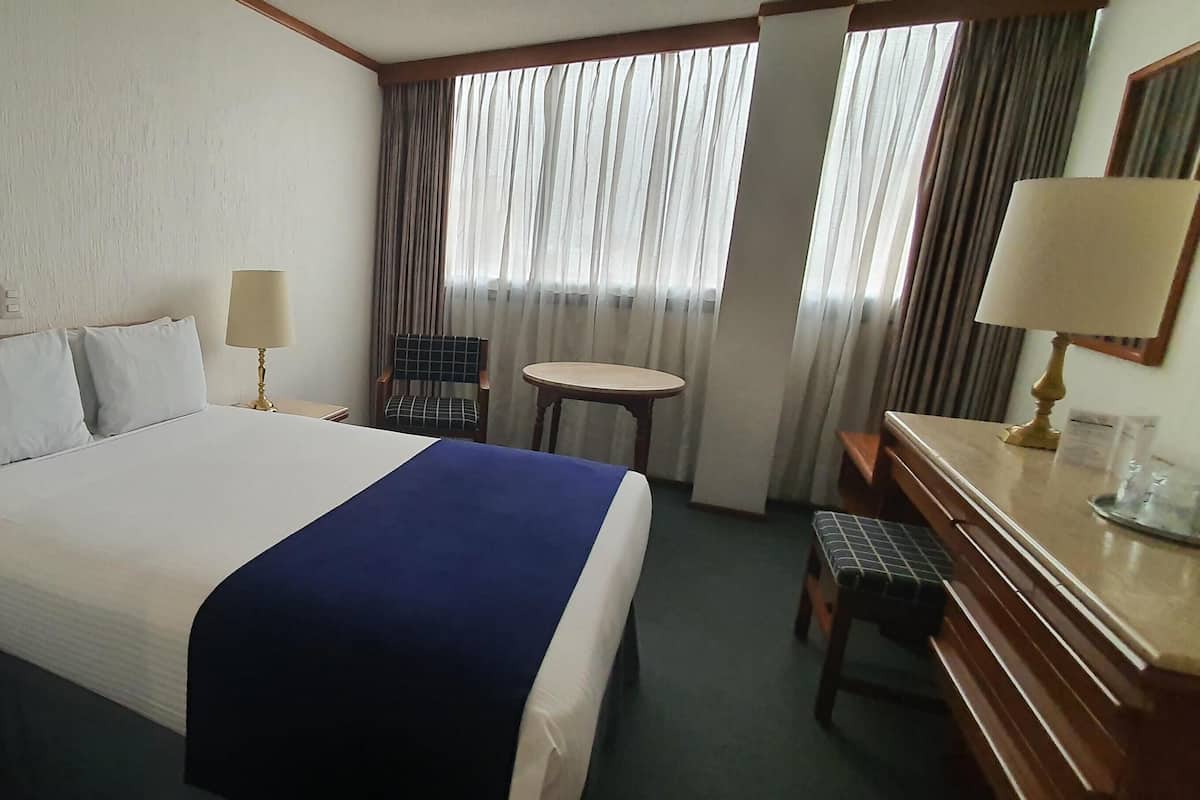 In-room safe, desk, blackout curtains, iron/ironing board