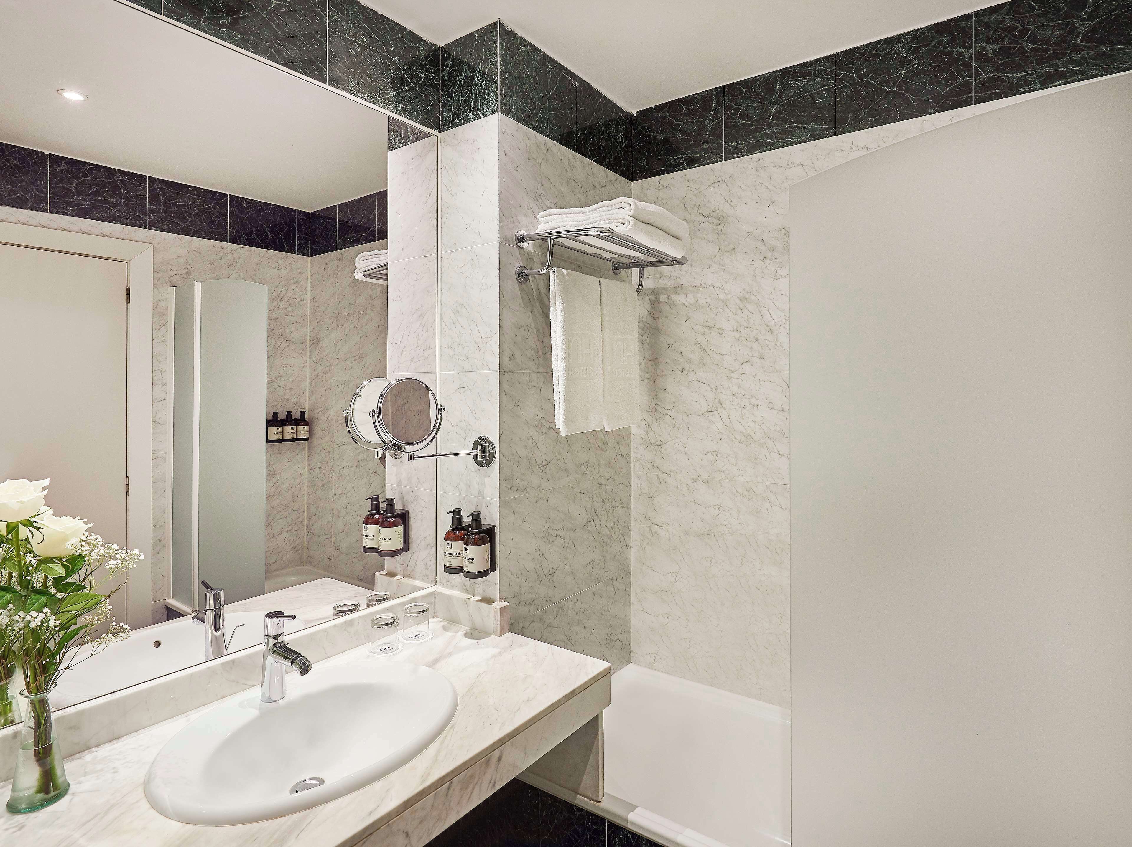 bathtub, deep-soaking bathtub, eco-friendly toiletries, hair dryer