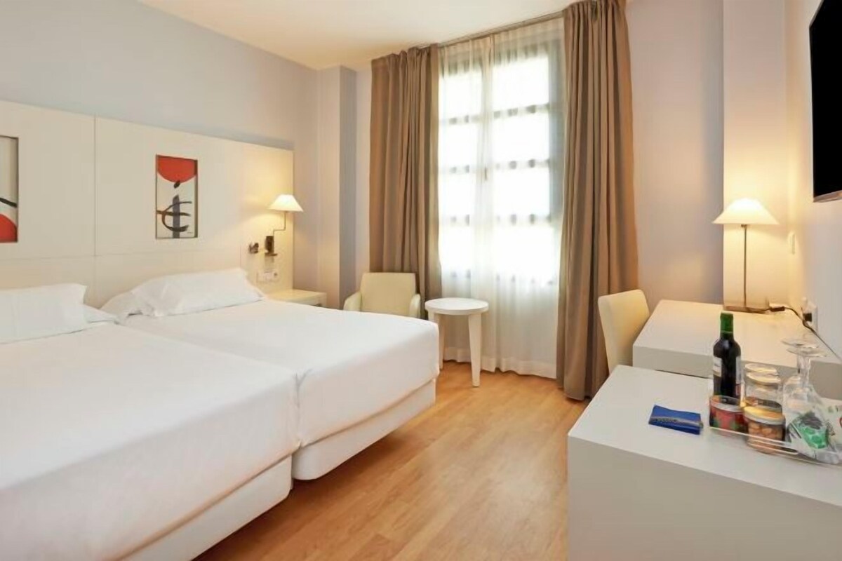 Ropa de cama de alta calidad y minibar 
