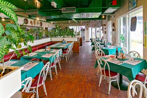 Enjoy a casual dining experience in our spacious restaurant with comfortable seating for groups.