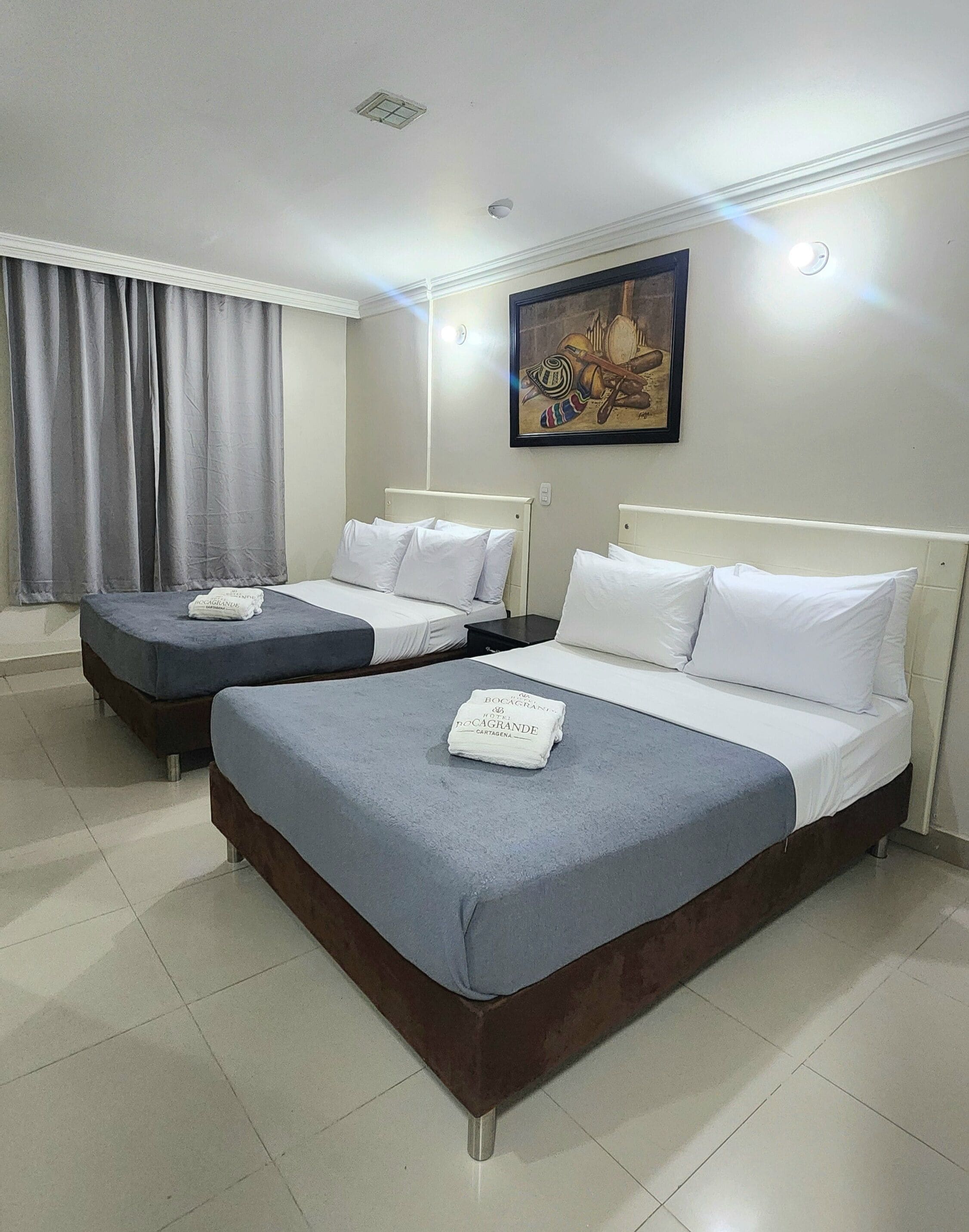 Standard Quadruple Room, Multiple Beds | Hypo-allergenic bedding, minibar, in-room safe, desk
