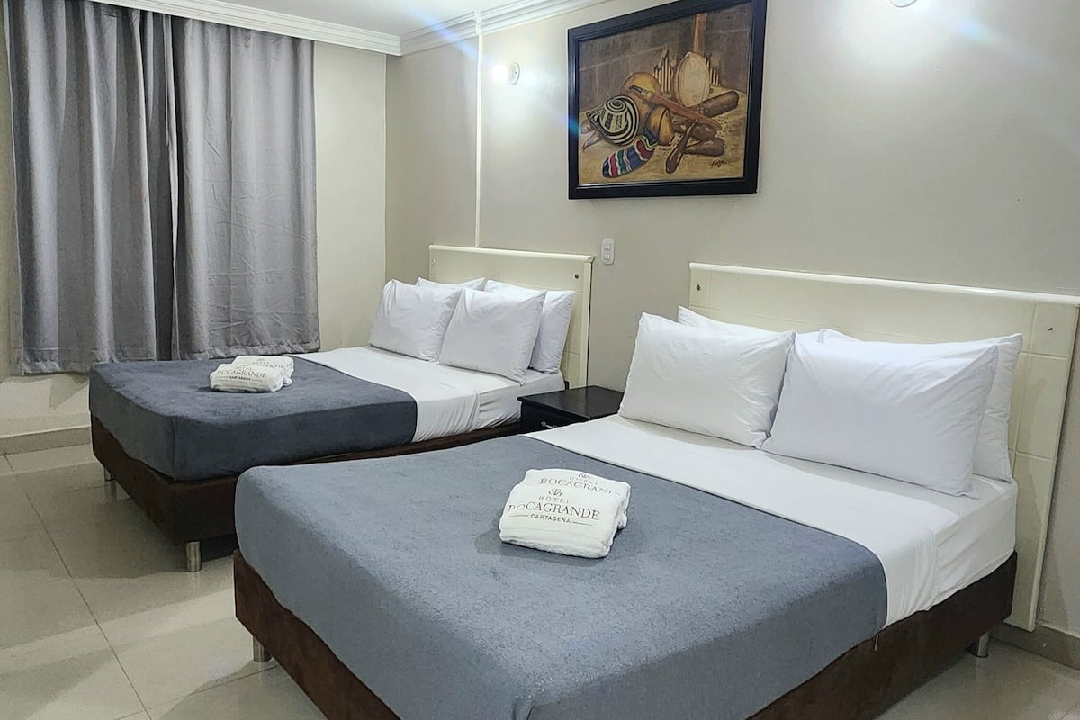 Standard Quadruple Room, Multiple Beds | Hypo-allergenic bedding, minibar, in-room safe, desk