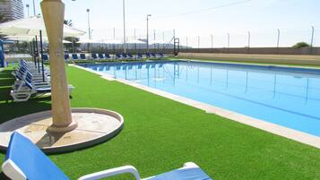 Seasonal outdoor pool, pool umbrellas, sun loungers