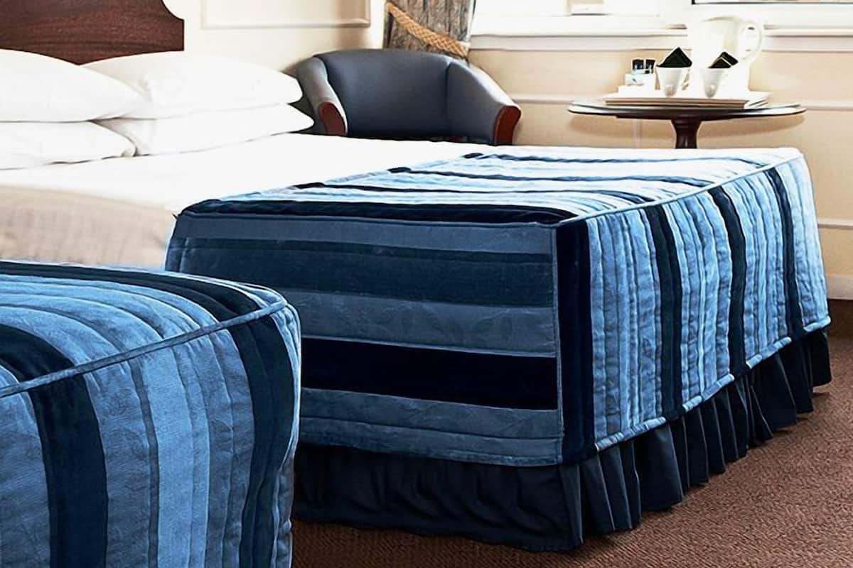 Desk, soundproofing, iron/ironing board, free cribs/infant beds