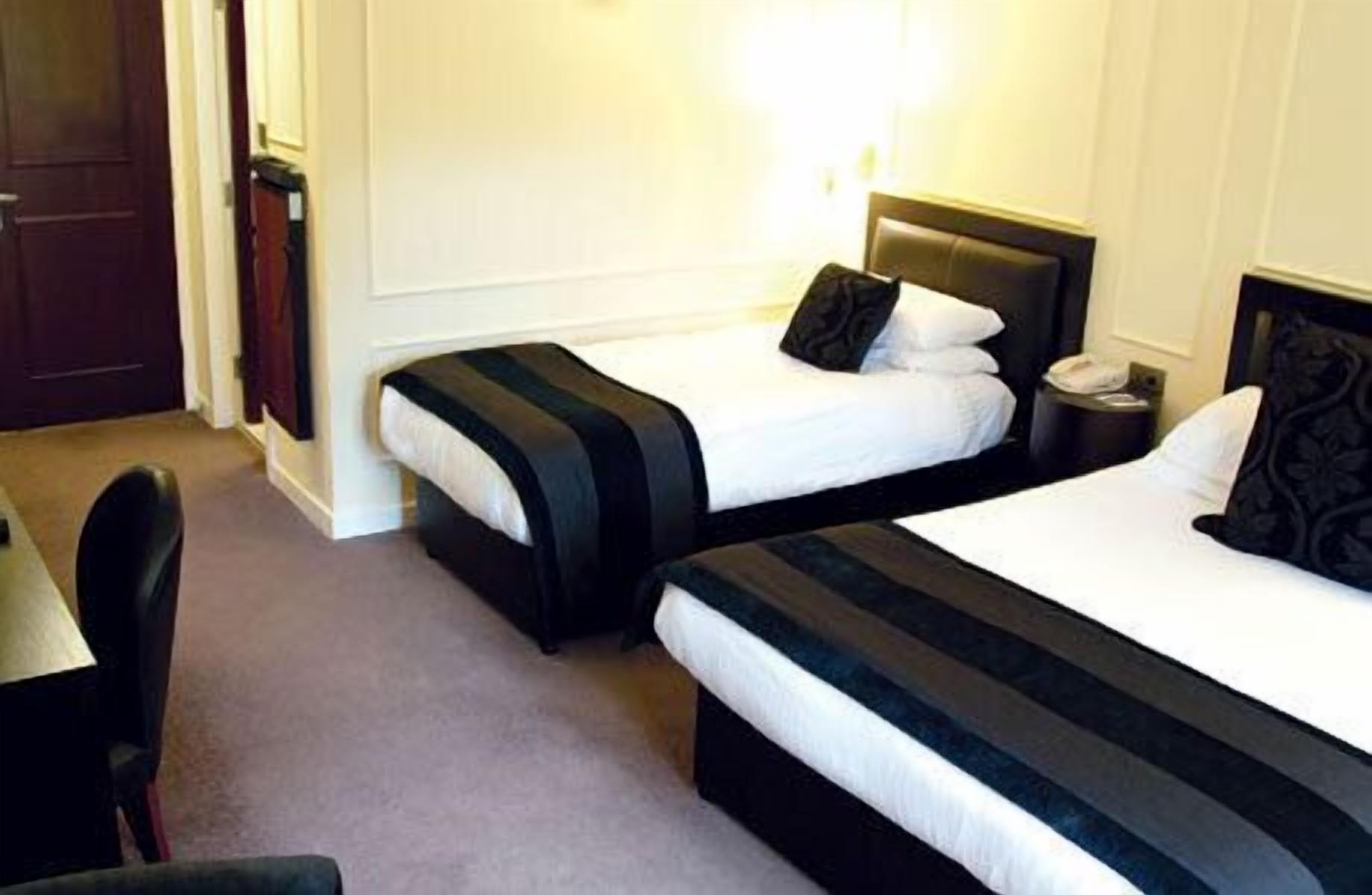 Desk, soundproofing, iron/ironing board, free cribs/infant beds