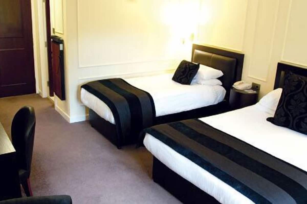 Desk, soundproofing, iron/ironing board, free cribs/infant beds