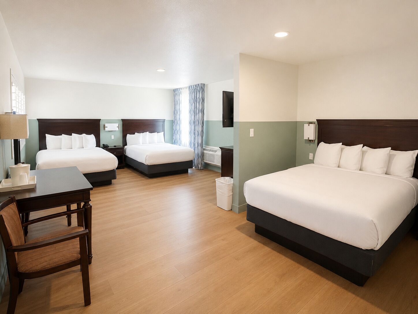 Family Room, Multiple Beds | Desk, iron/ironing board, free WiFi, bed sheets