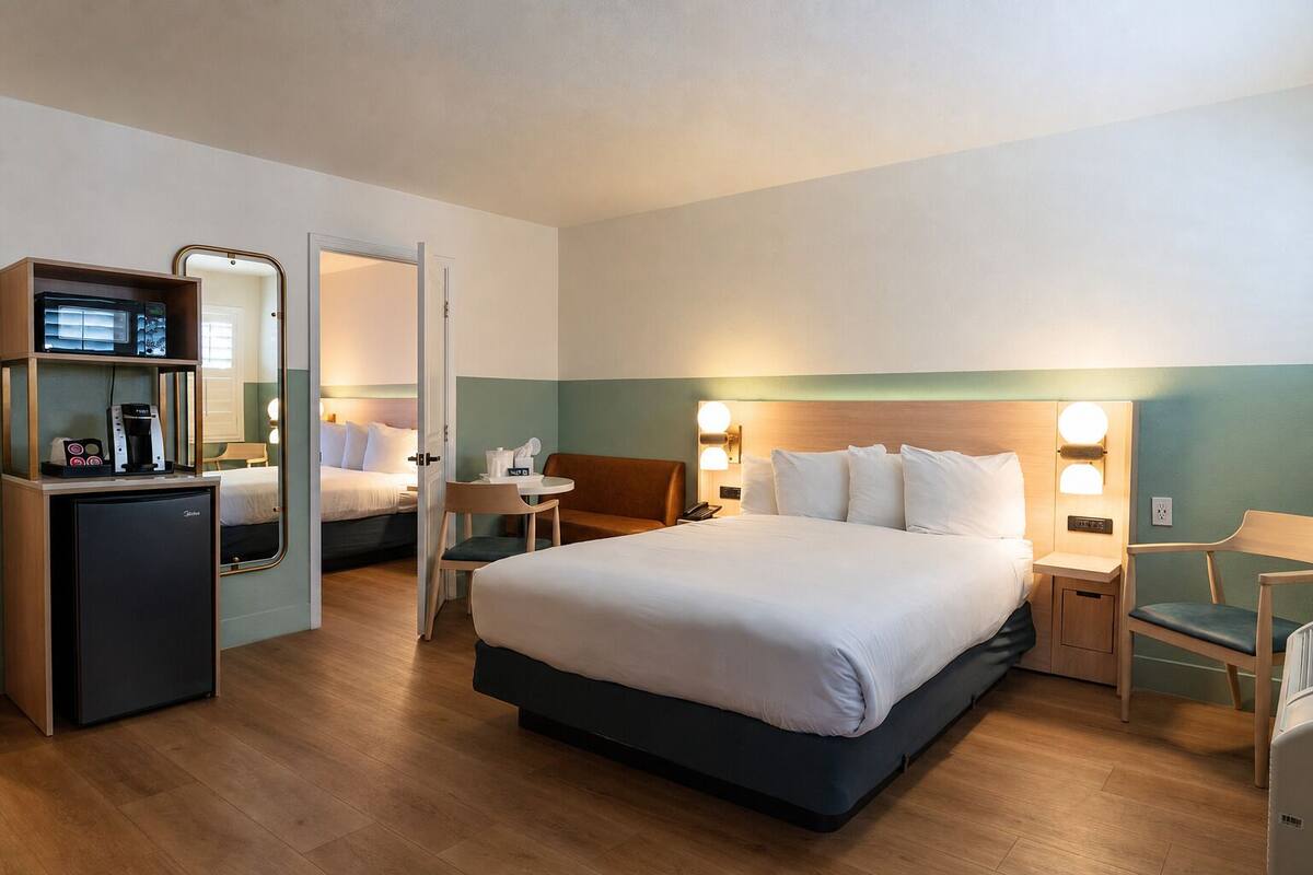 One Bedroom Suite, 2 Queen Beds, Balcony | Desk, iron/ironing board, WiFi (free), bed sheets