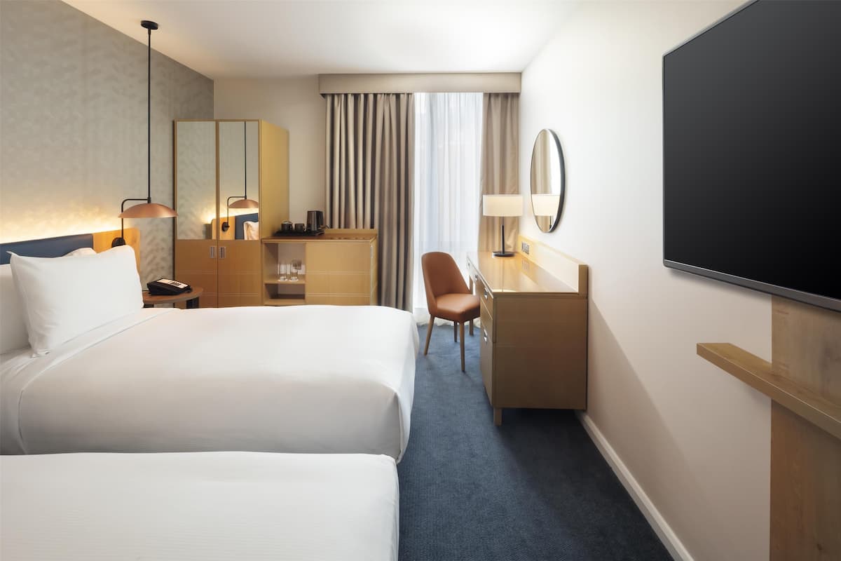 Hypo-allergenic bedding, in-room safe, desk, laptop workspace
