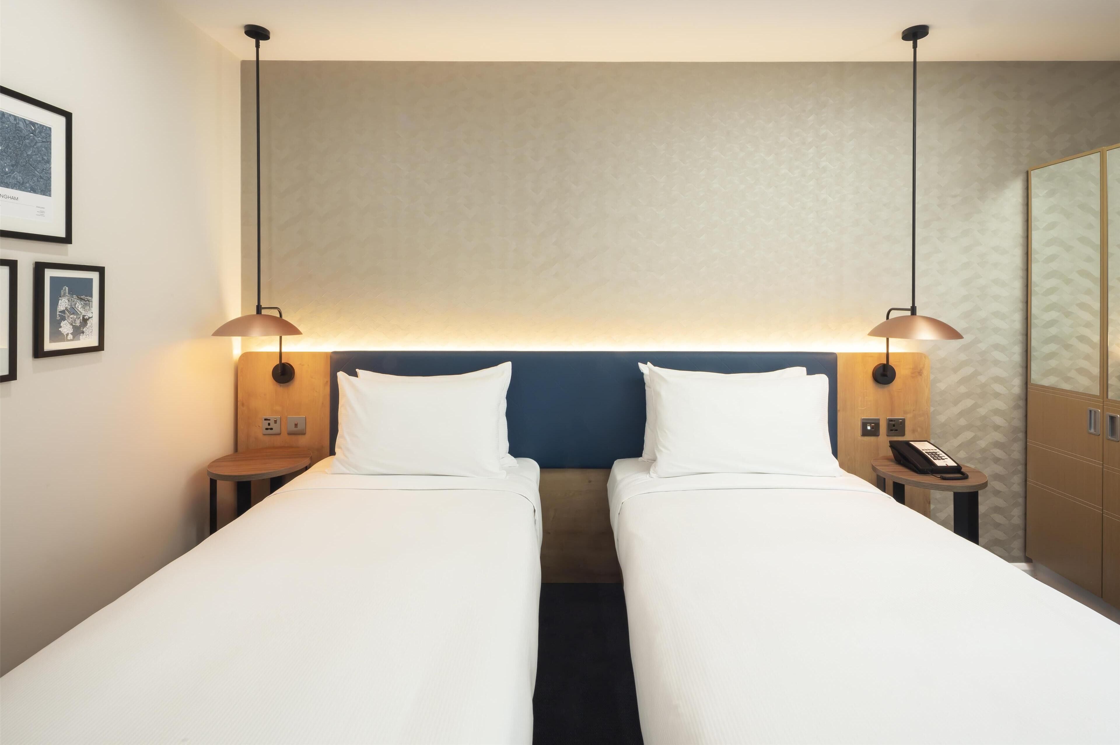 hypo-allergenic bedding, in-room safe, desk, laptop workspace