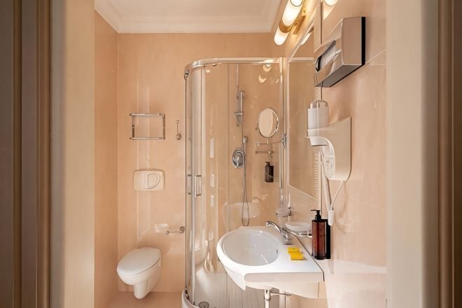 Bathroom | Shower, hair dryer, slippers, bidet