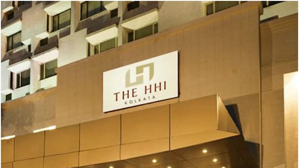 A hotel entrance with a sign reading "THE HHI KOLKATA". - The HHI Kolkata (Kolkata)