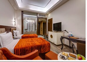 Down duvets, Select Comfort beds, minibar, in-room safe