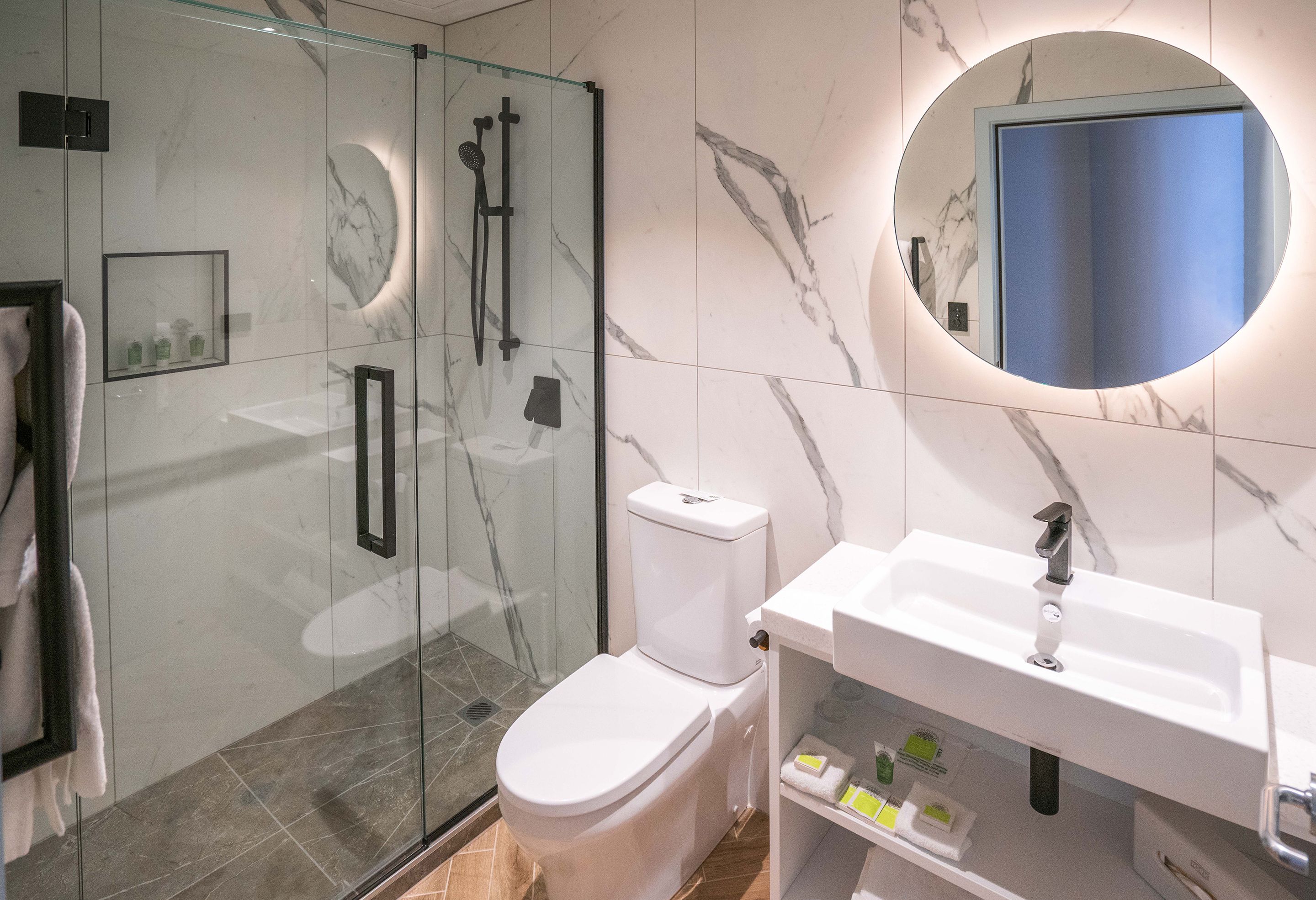 premier split king, 1 king bed | bathroom | shower, free toiletries, hair dryer, bathrobes