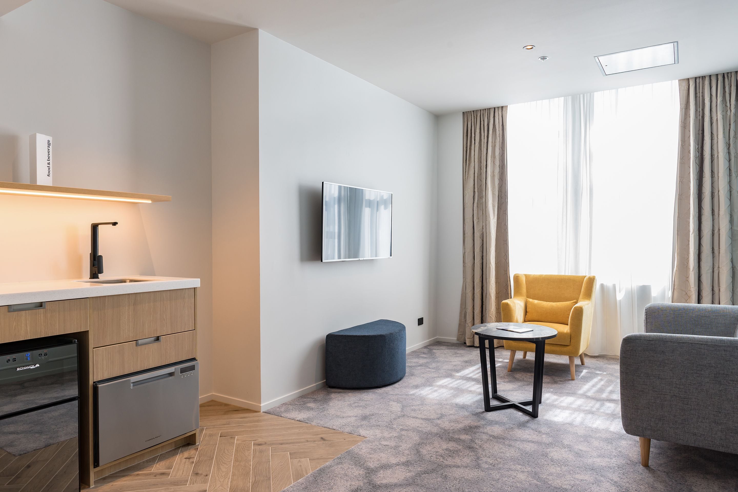 premier studio suite, 1 queen bed | premium bedding, minibar, in-room safe, iron/ironing board