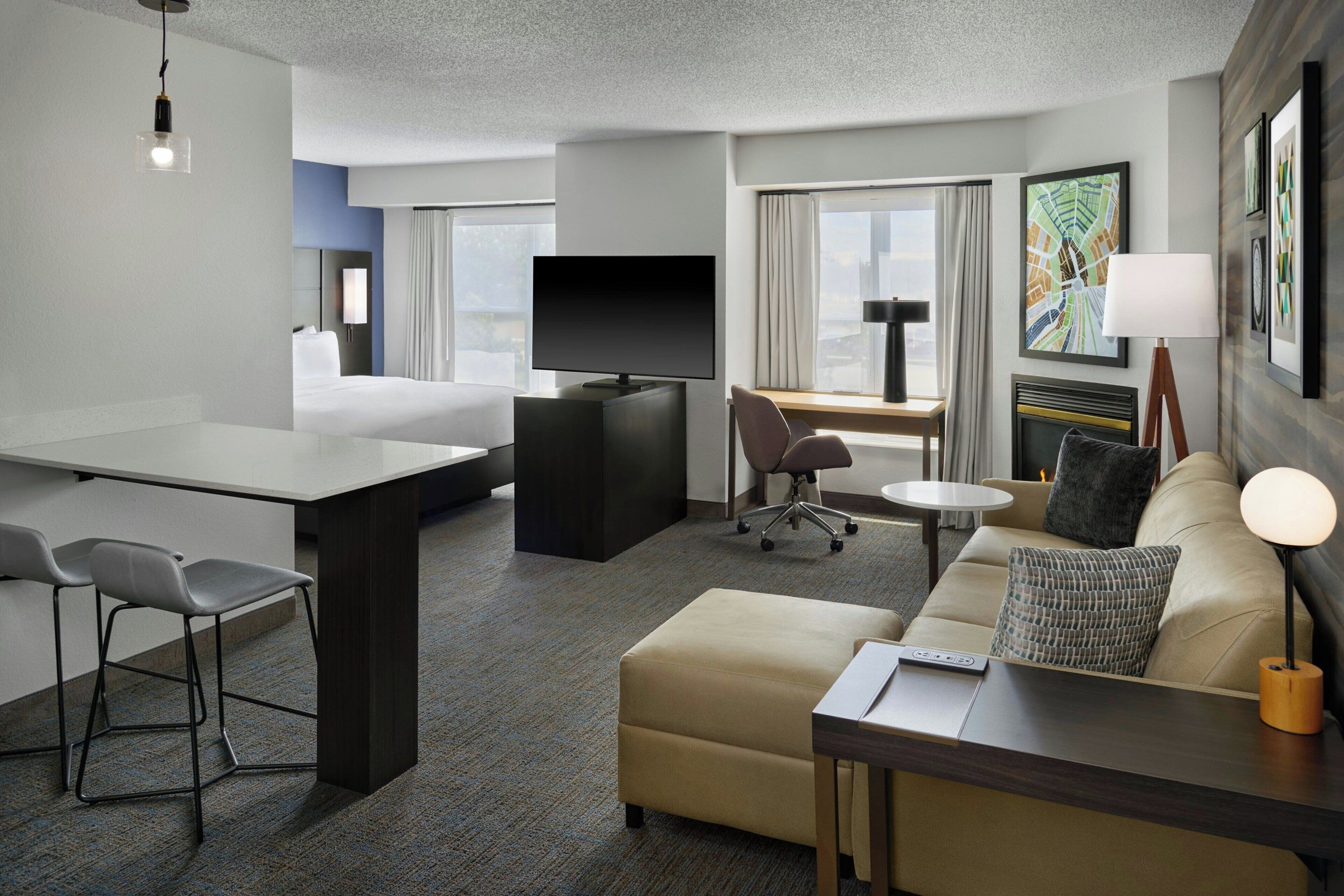 Studio, 1 King Bed with Sofa bed, City View (Fireplace) | Living area | Flat-screen TV