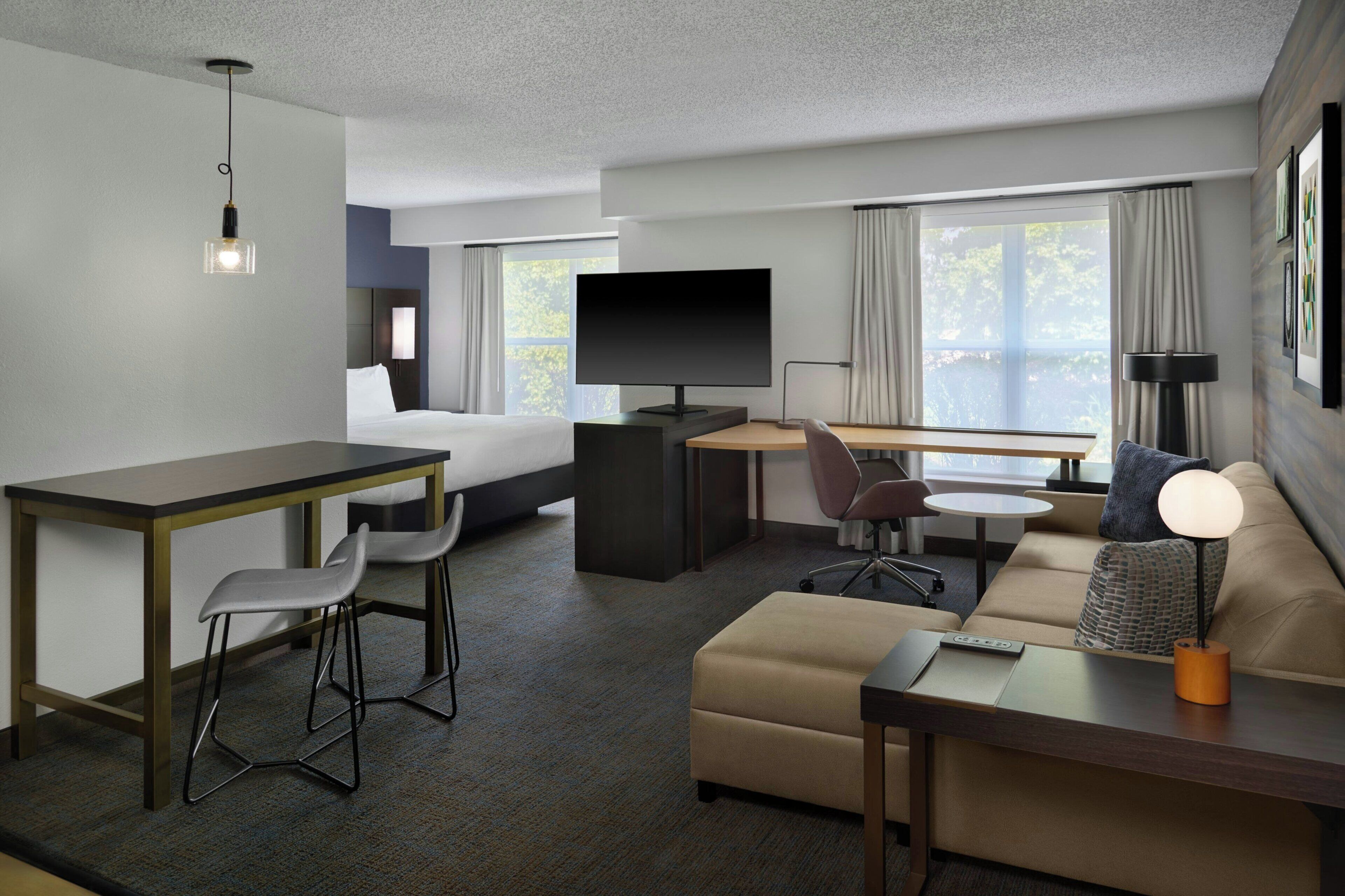 Studio, 1 King Bed with Sofa bed, City View | Living area | Flat-screen TV