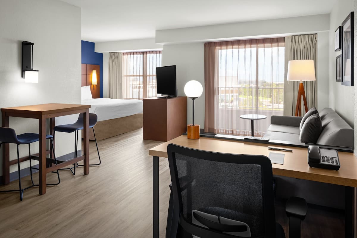 studio, 1 king bed with sofa bed | living area | 45-inch tv with cable channels