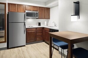 Studio, 1 King Bed with Sofa bed | Private kitchen | Full-sized fridge, microwave, stovetop, dishwasher