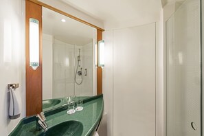 Shower, eco-friendly toiletries, hair dryer, towels