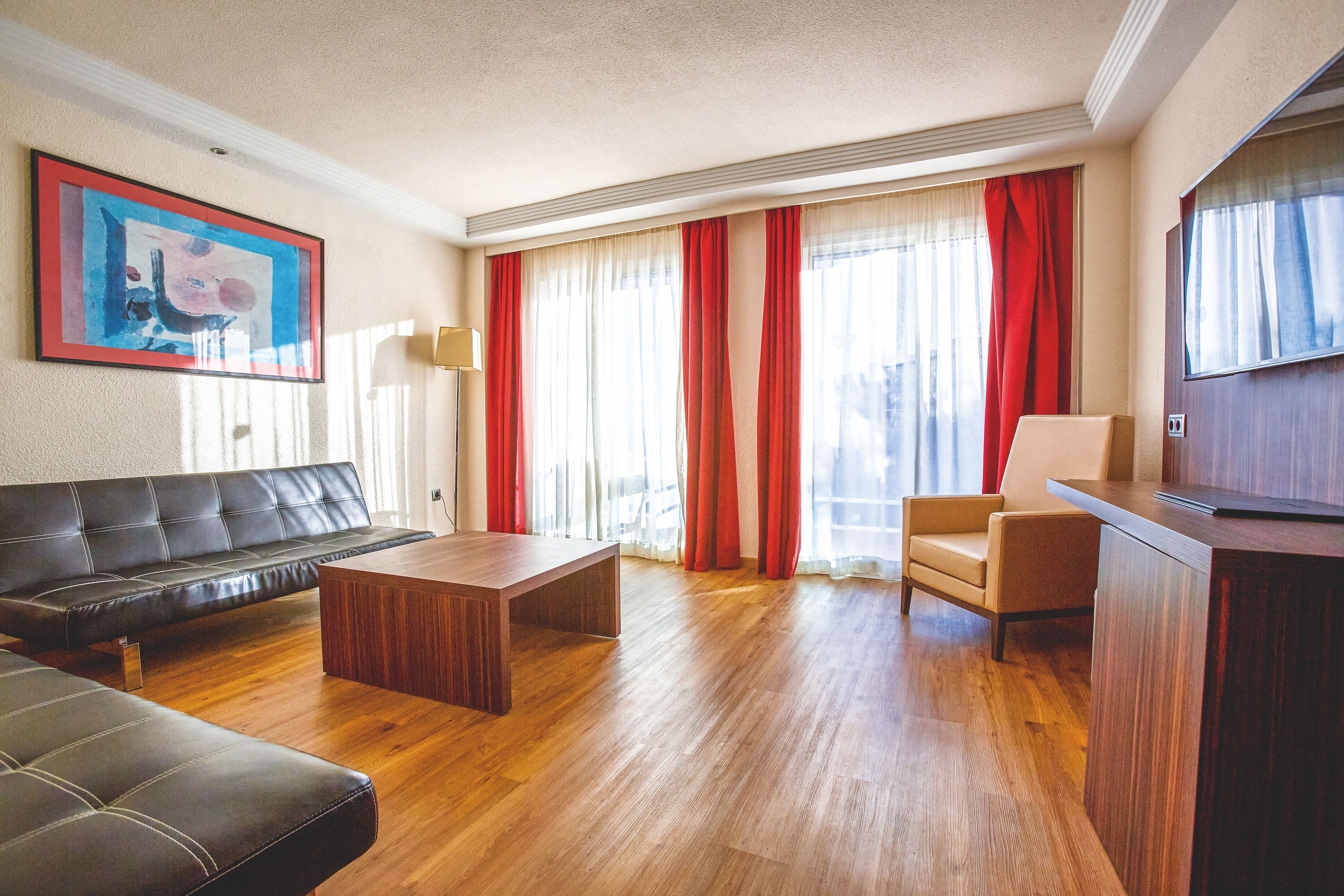 junior suite, partial sea view | 1 bedroom, in-room safe, desk, blackout curtains
