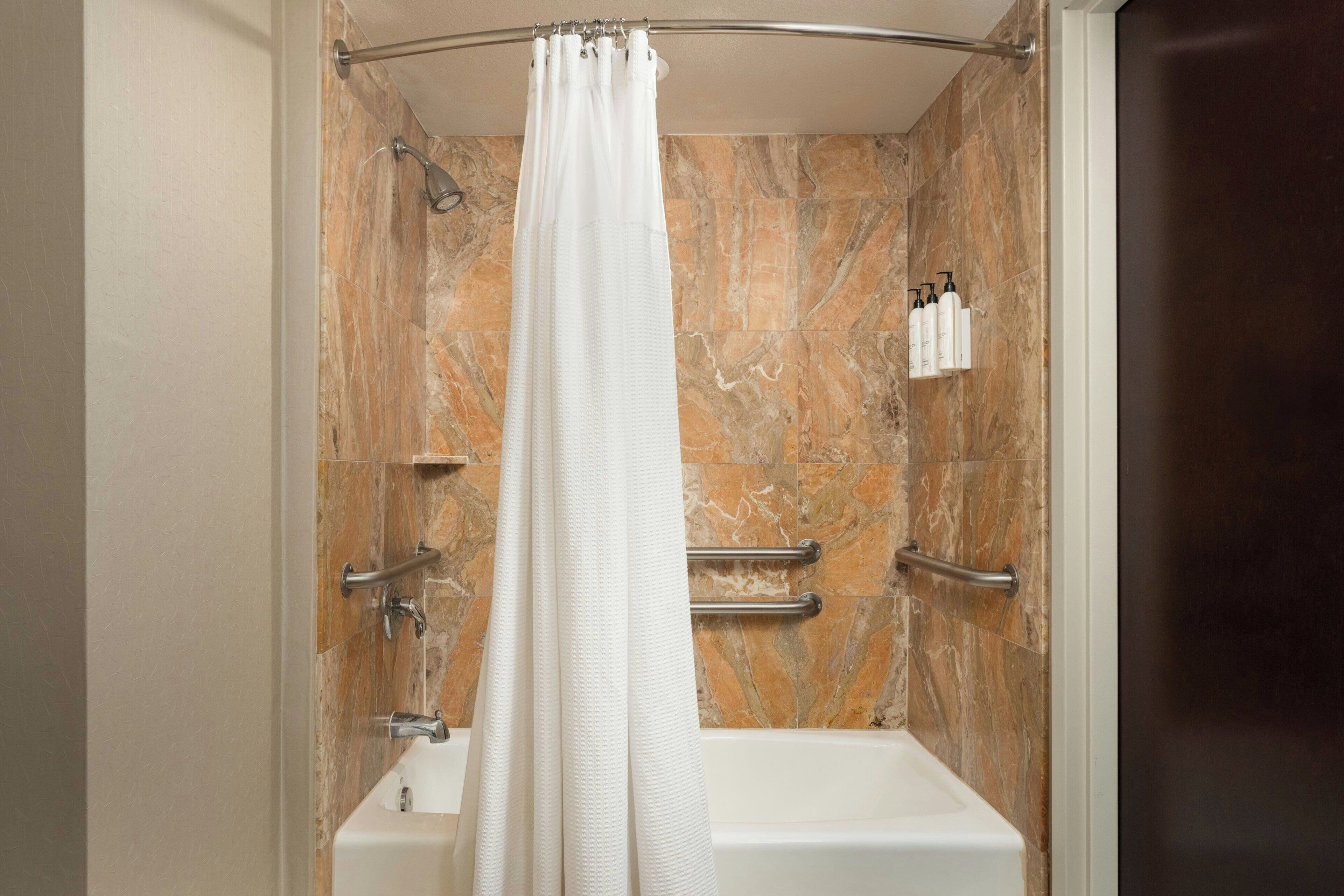 shower, free toiletries, hair dryer, towels