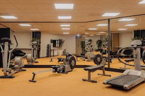 Stay fit and active with our well-equipped gym featuring treadmills, stationary bikes, and weightlifting equipment.