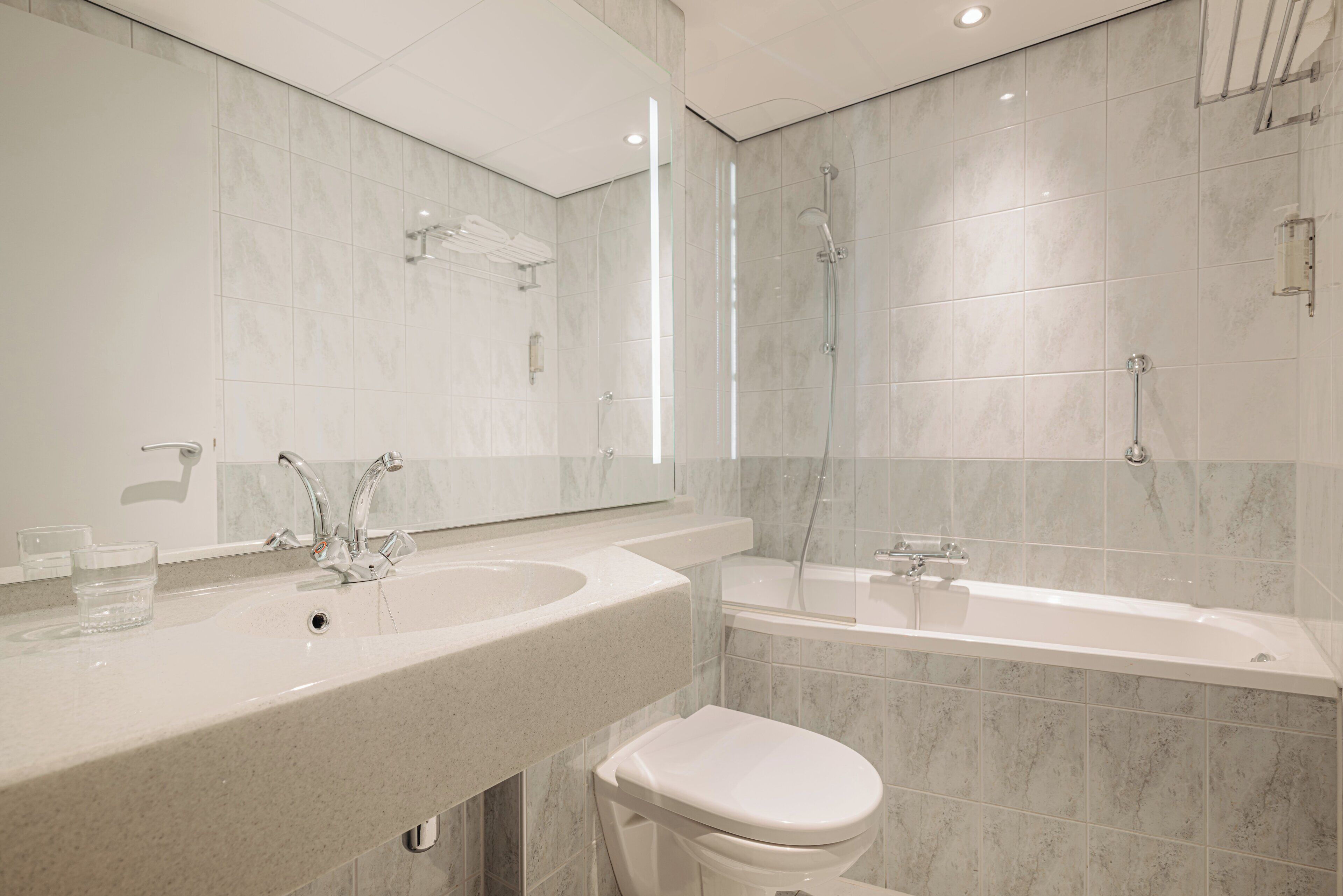 combined shower/bathtub, free toiletries, hair dryer, towels