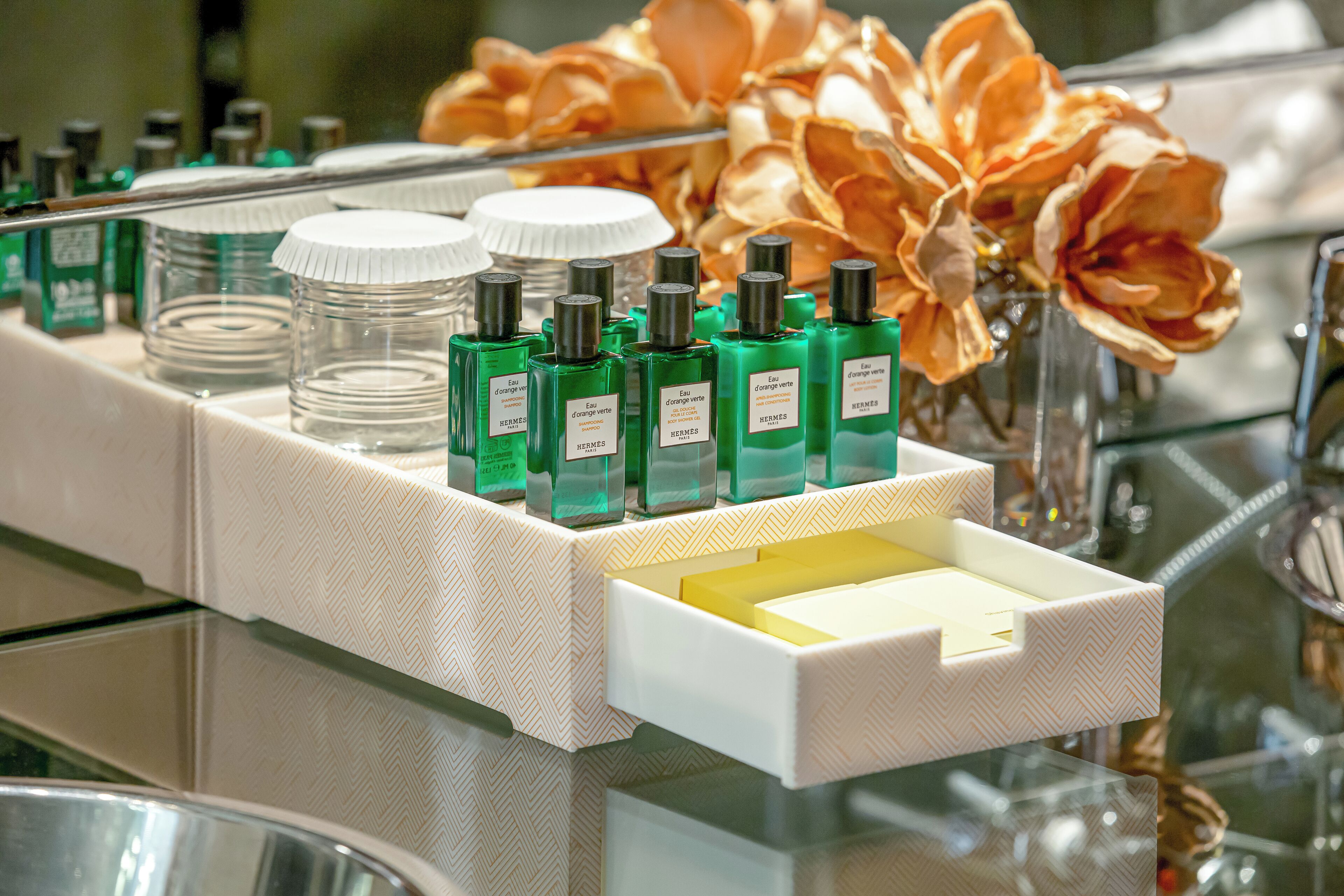 separate bathtub and shower, rainfall showerhead, designer toiletries