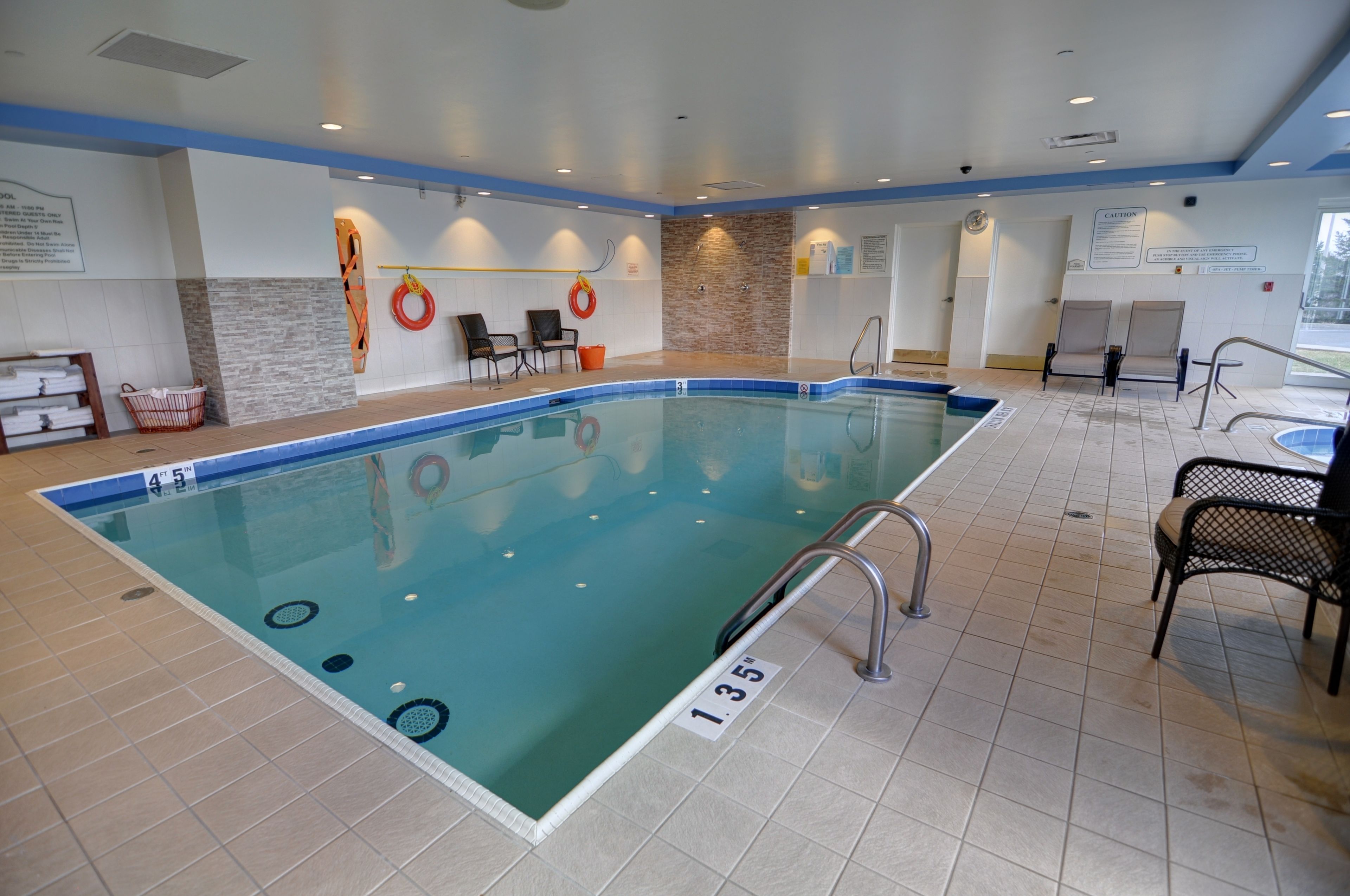 indoor pool, open 7:00 am to 11:00 pm, pool loungers