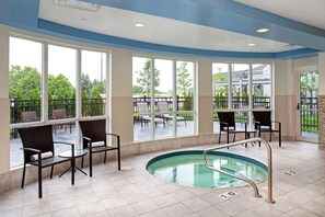 Indoor pool, open 7:00 AM to 11:00 PM, pool loungers