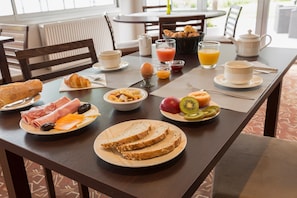 Daily buffet breakfast (EUR 15 per person)