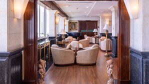 A luxurious lobby with marble floors, plush seating, and elegant decor. - Crowne Plaza Amman by IHG (Amman)