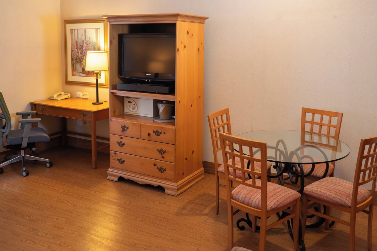 Suite, 1 King Bed (Living) | Down comforters, in-room safe, desk, iron/ironing board