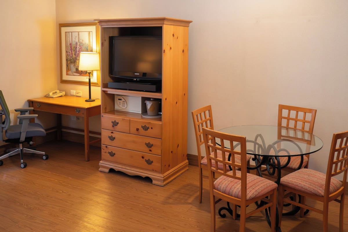 Suite, 1 King Bed (Living) | Down comforters, in-room safe, desk, iron/ironing board