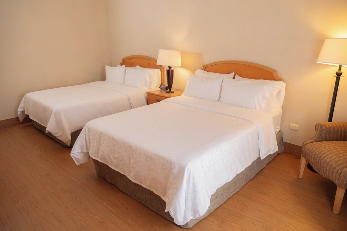 Standard Room, 2 Queen Beds | Down comforters, in-room safe, desk, iron/ironing board