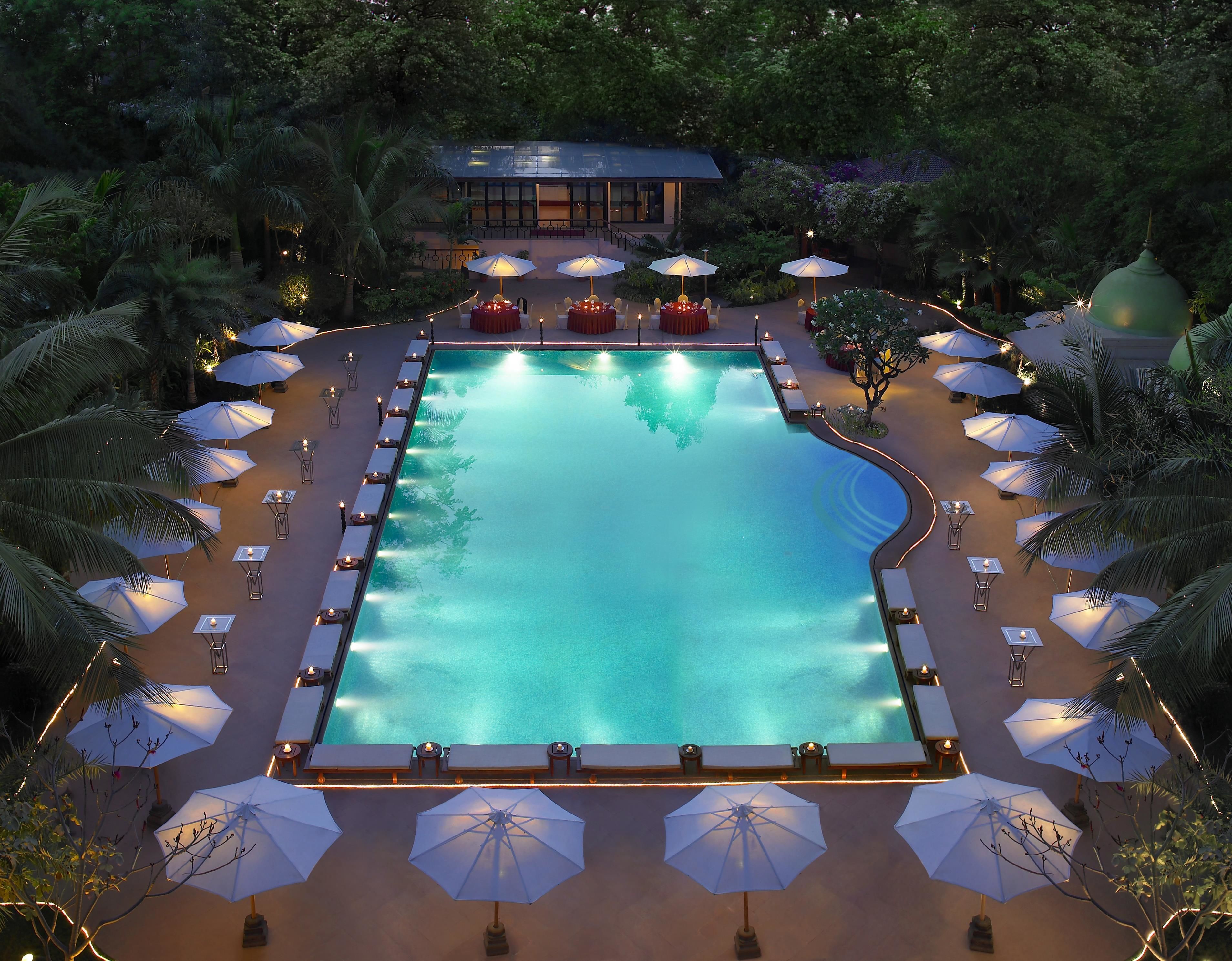 outdoor pool, pool umbrellas, pool loungers