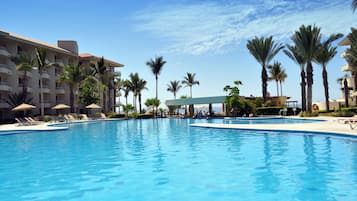 5 outdoor pools, open 8:00 AM to 10:00 PM, pool umbrellas, sun loungers