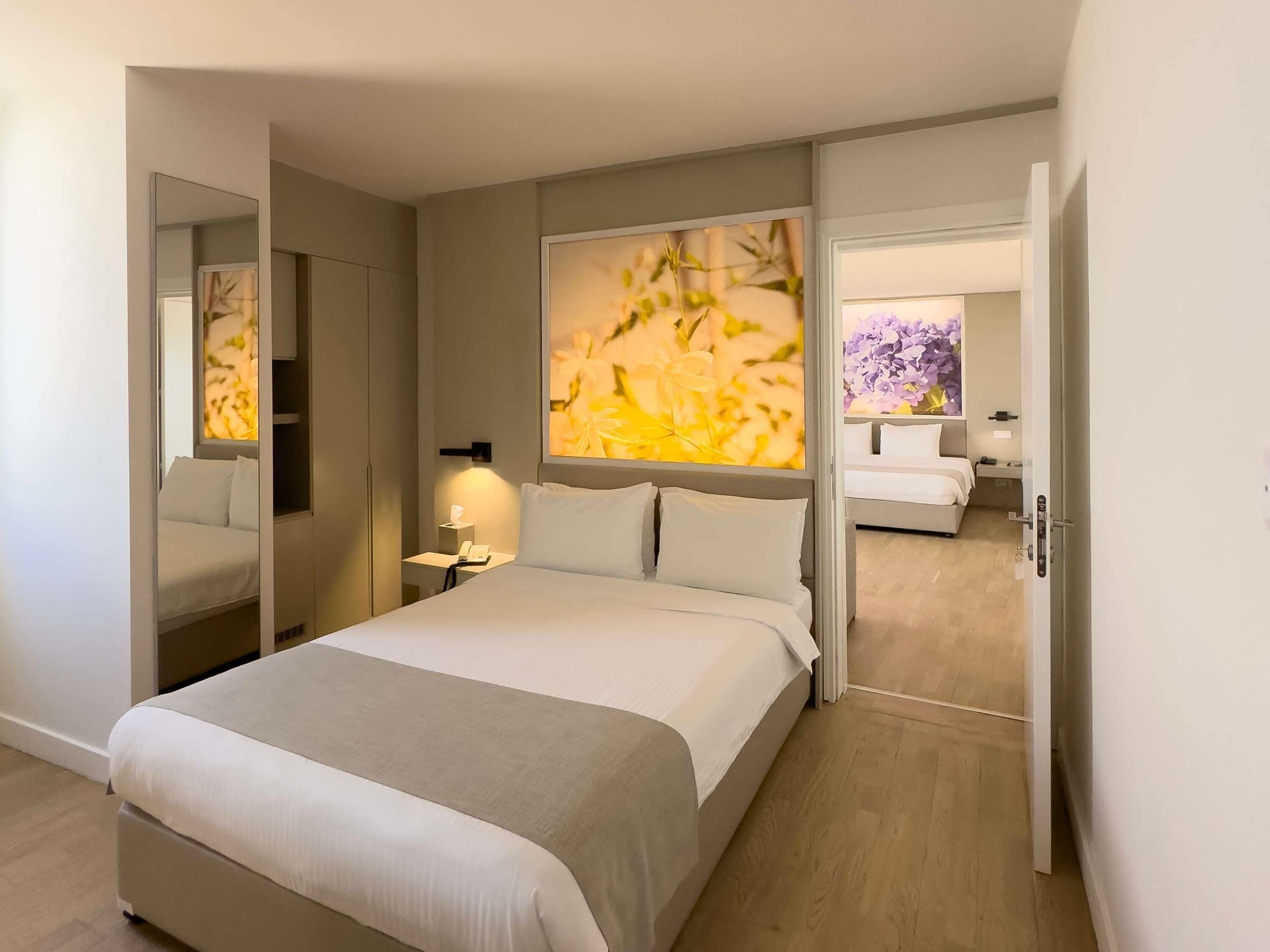 Deluxe Suite, Multiple Beds | Frette Italian sheets, premium bedding, Select Comfort beds, minibar