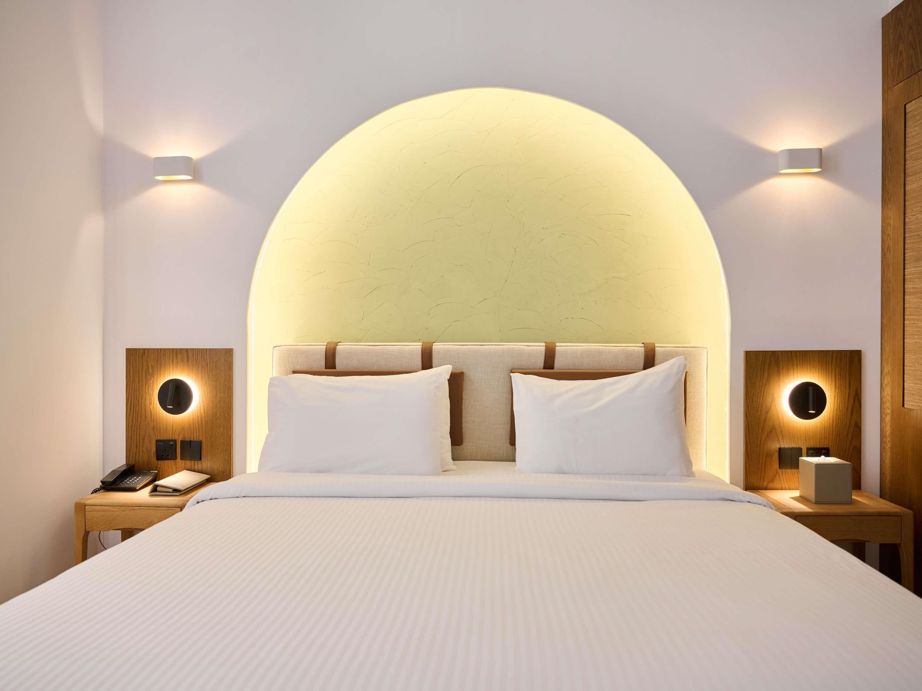 Frette Italian sheets, premium bedding, Select Comfort beds, minibar