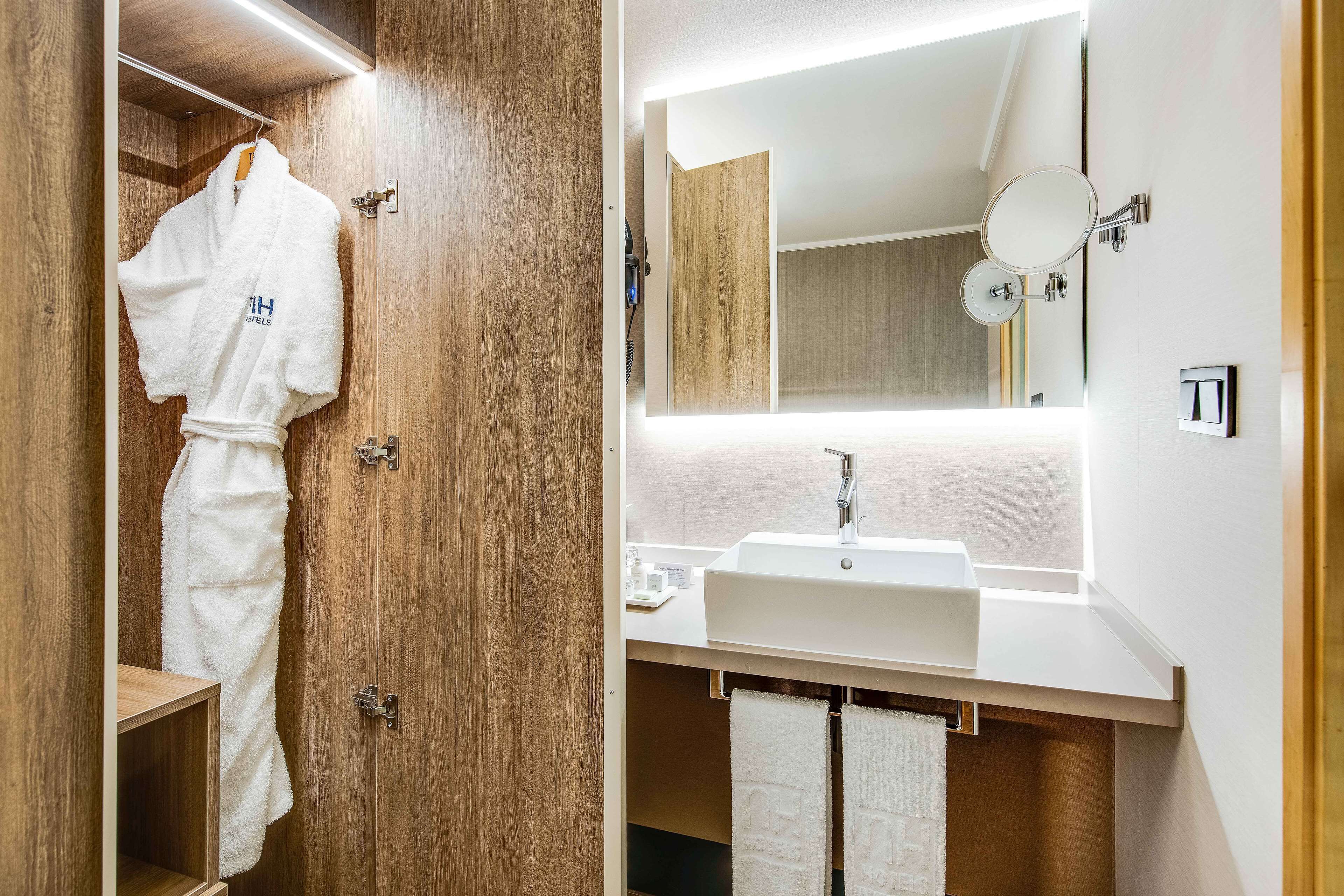 shower, eco-friendly toiletries, hair dryer, towels