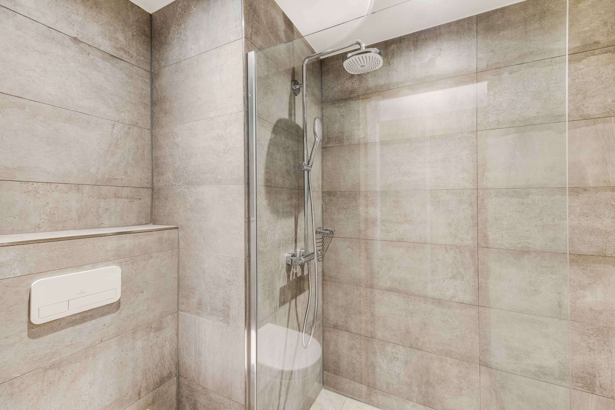 shower, eco-friendly toiletries, hair dryer, towels