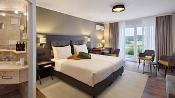 Superior Zimmer mit Doppelbett oder 2 Einzelbetten | 1 Schlafzimmer, hochwertige Bettwaren, Minibar, Zimmersafe