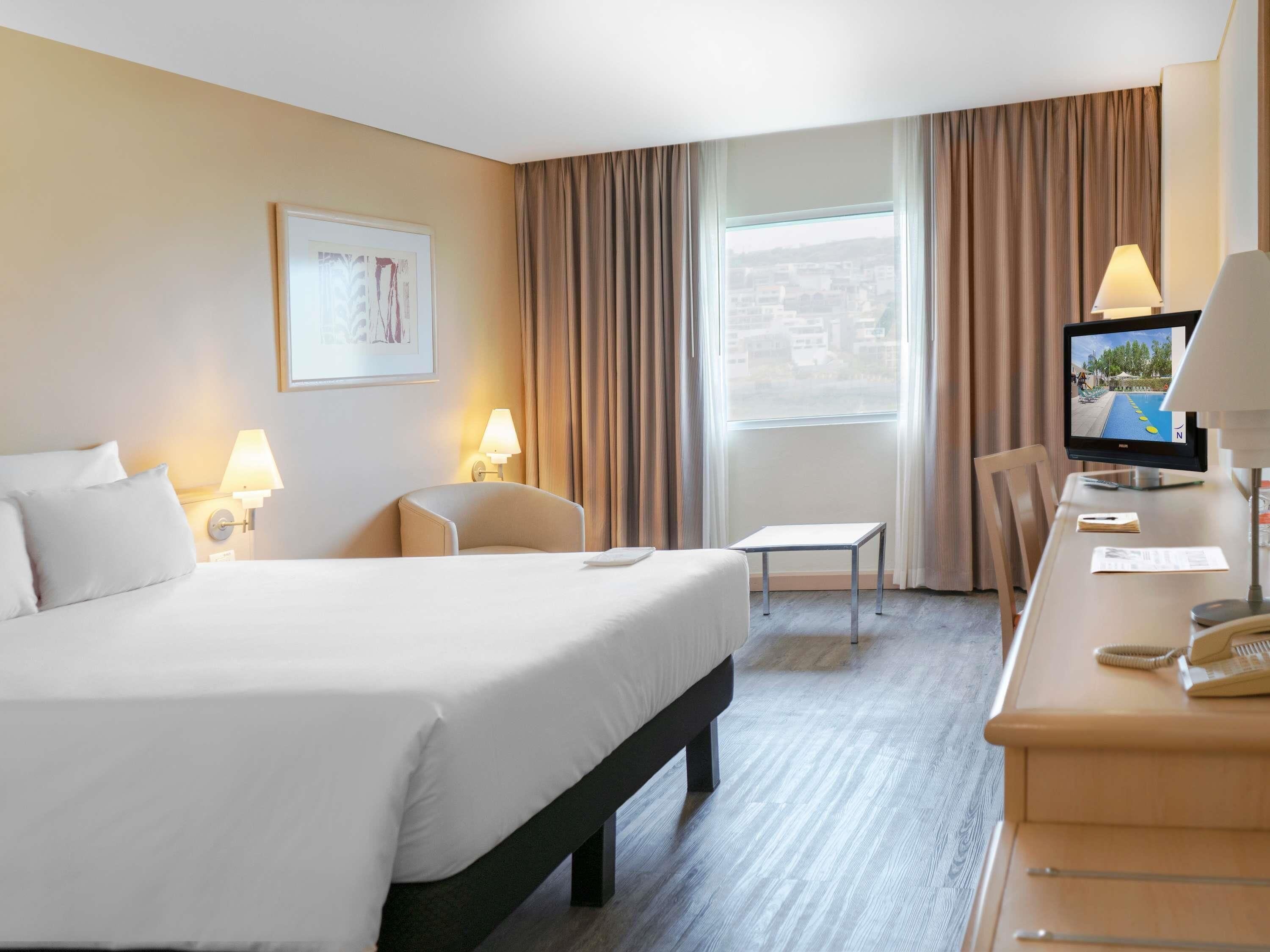 In-room safe, desk, laptop workspace, blackout curtains