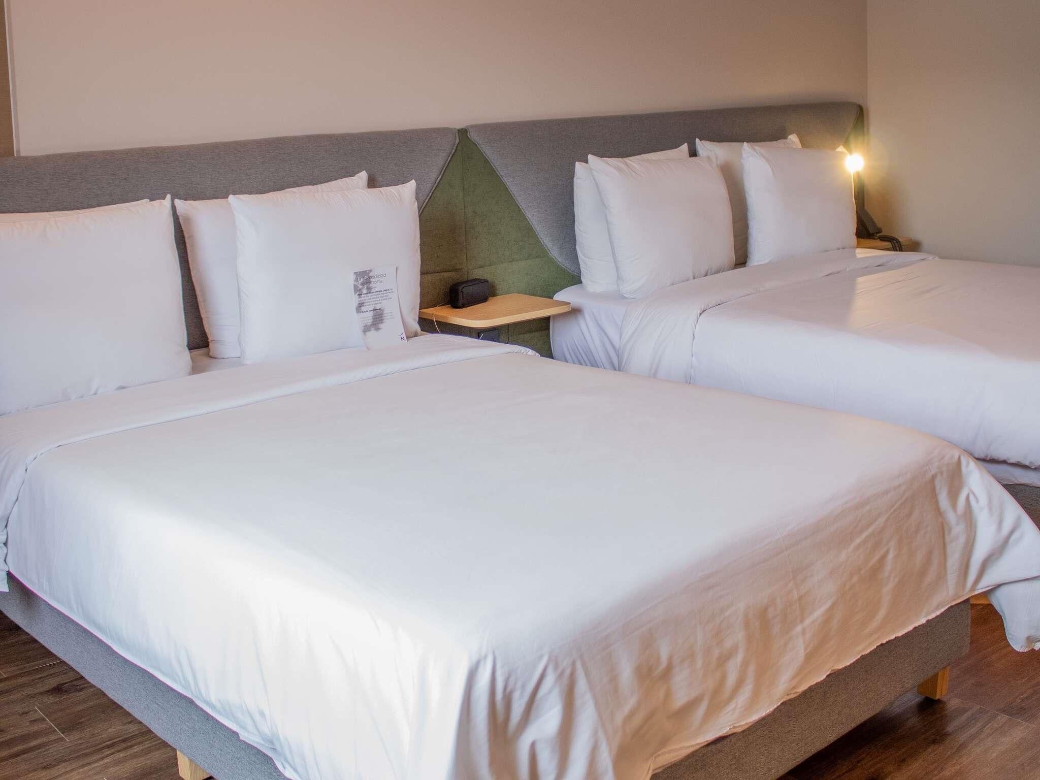 Executive Room, 2 Double Beds | In-room safe, desk, laptop workspace, blackout drapes