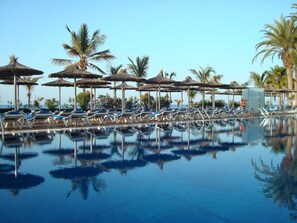 3 outdoor pools, pool umbrellas, pool loungers