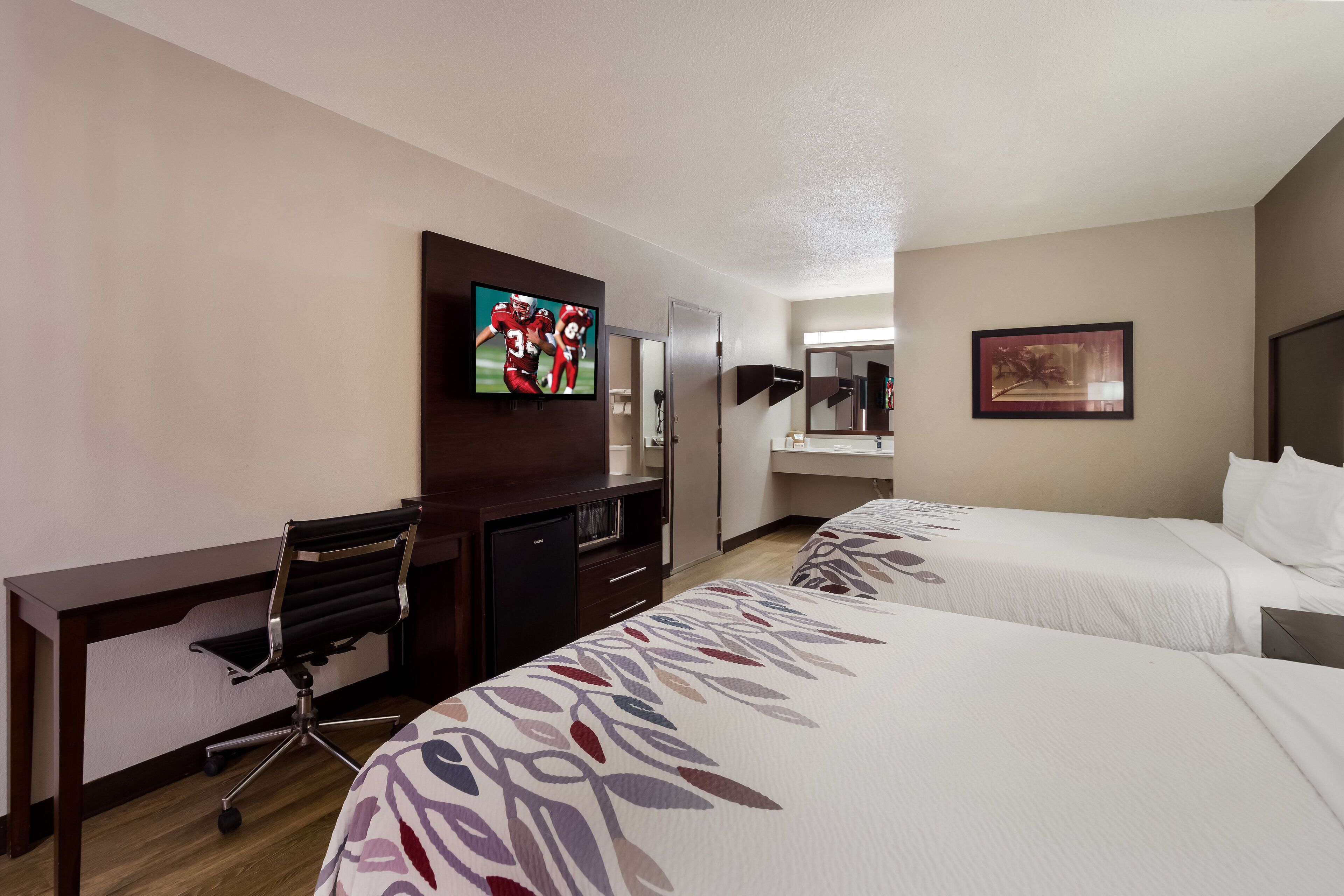 deluxe room, 2 double beds (smoke free) | desk, iron/ironing board, free cots/infant beds, free wifi