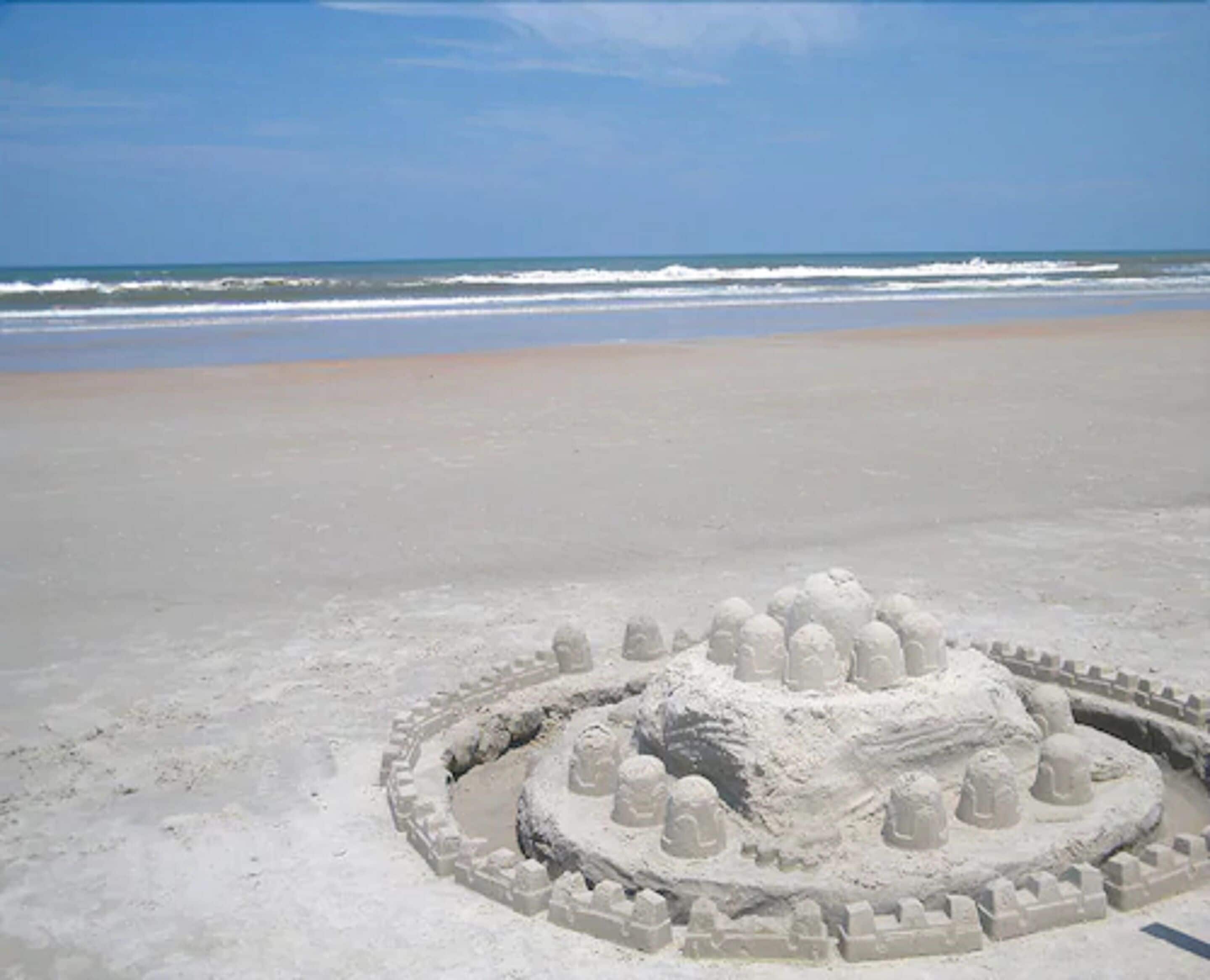 Di pantai, pasir putih, tuala pantai 