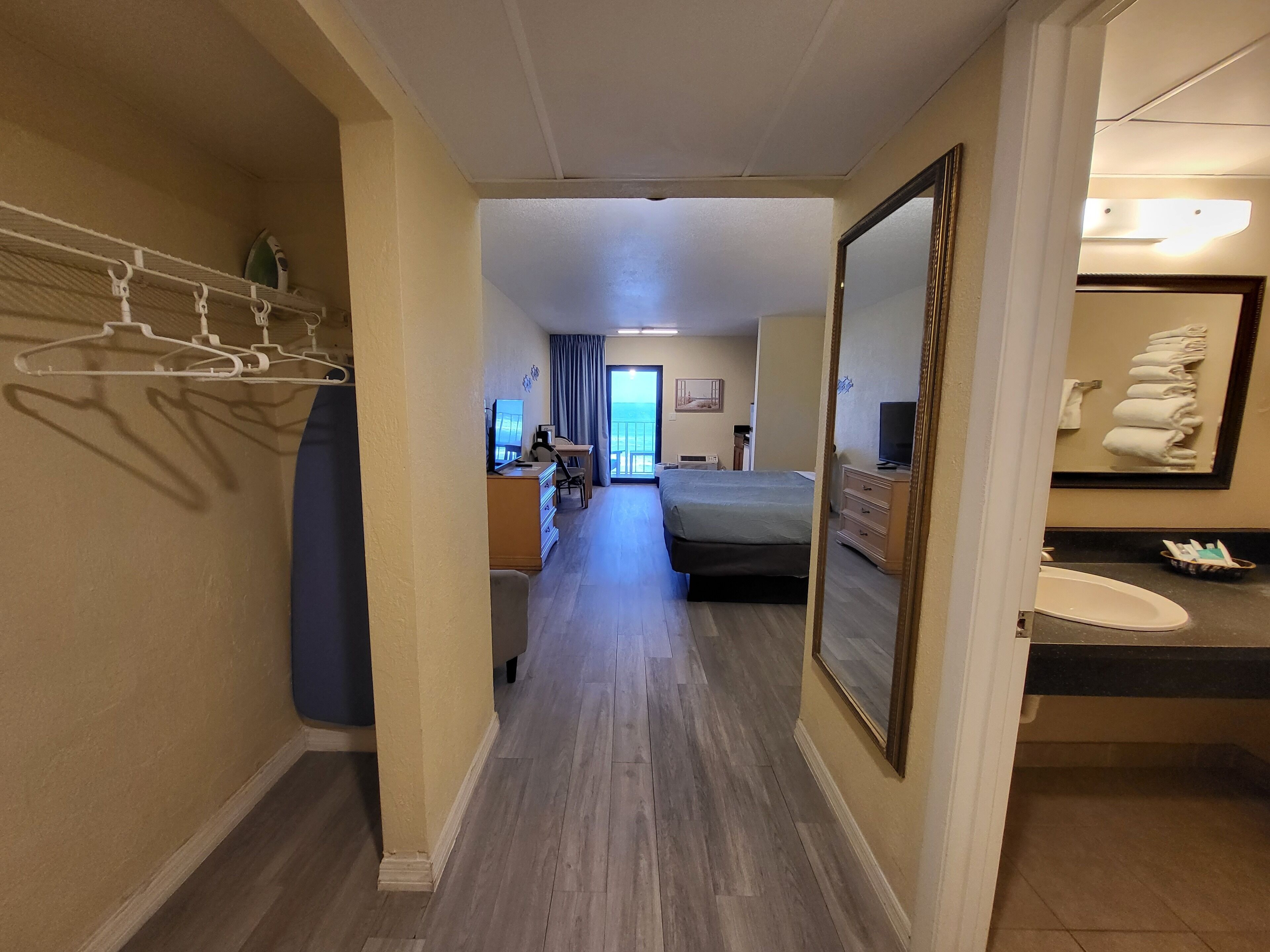 standard room, 1 king bed, kitchenette, oceanfront | living area | 50-inch led tv with cable channels, tv