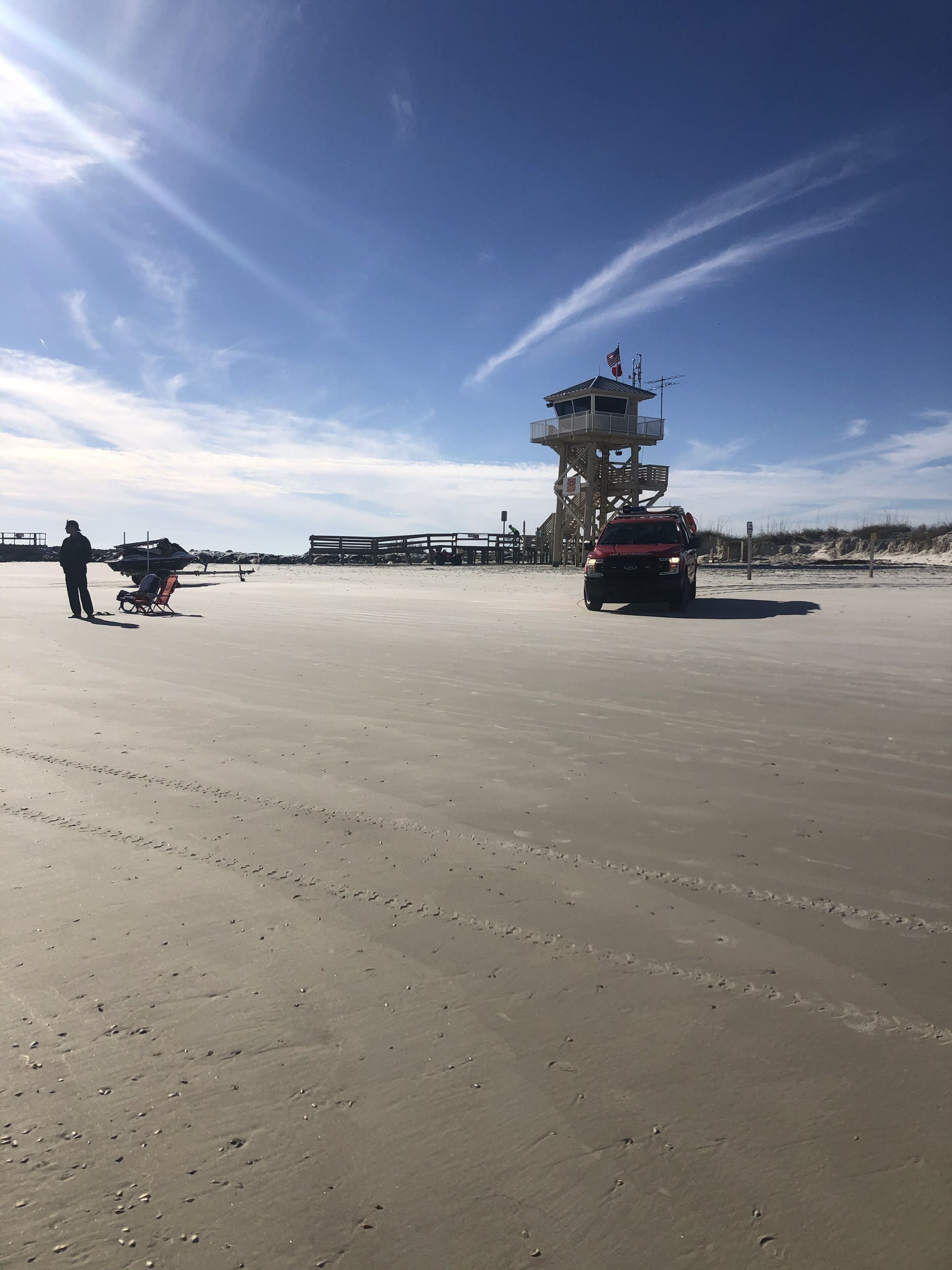 on the beach, white sand, beach towels